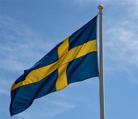 Skapa stämning med en flaggstång och välj en vimpel